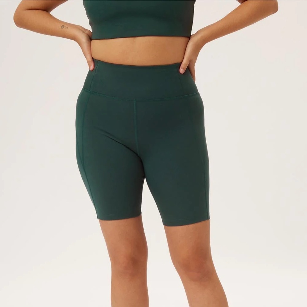 Girlfriend Collective High-Rise Bike Shorts in Moss